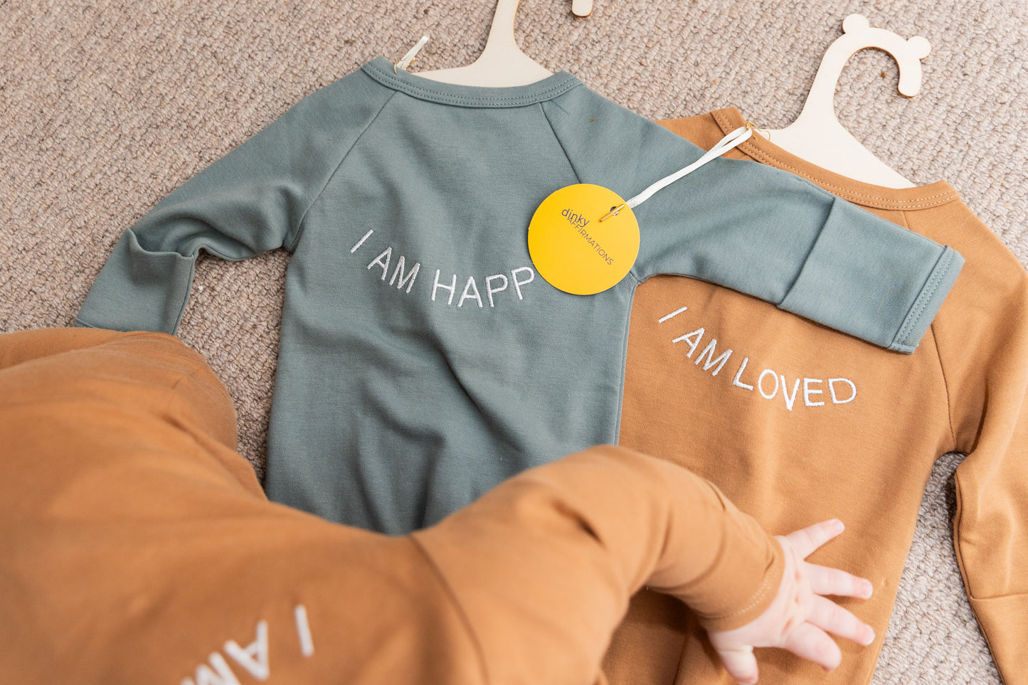 100% Organic Cotton Baby onesie with I AM HAPPY Affirmation Embroidery