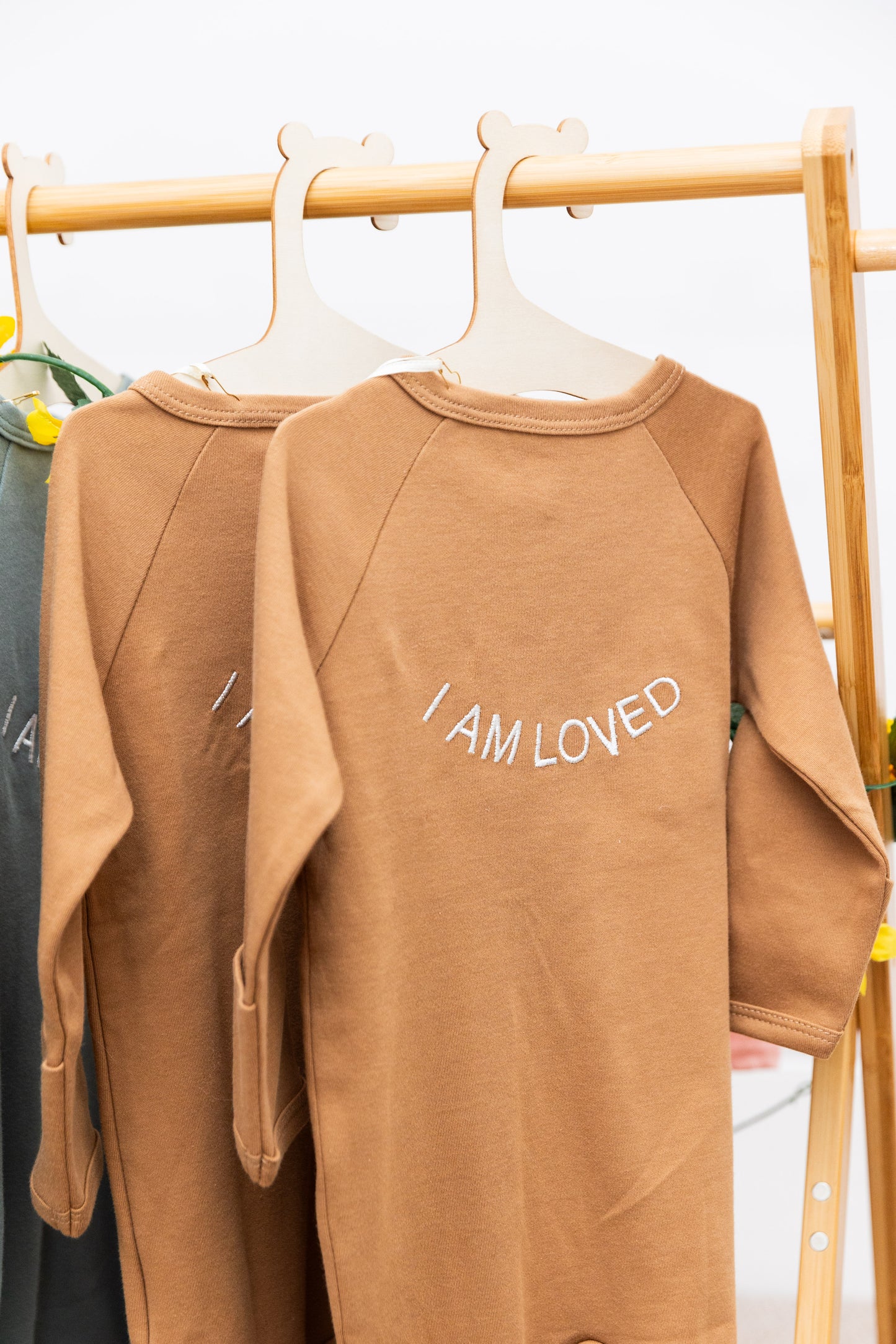 100% Organic Cotton Baby onesie with I AM LOVED Affirmation Embroidery