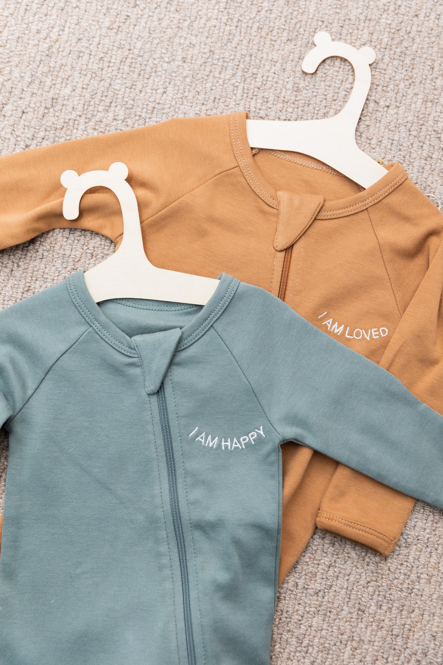 100% Organic Cotton Baby onesie with I AM LOVED Affirmation Embroidery