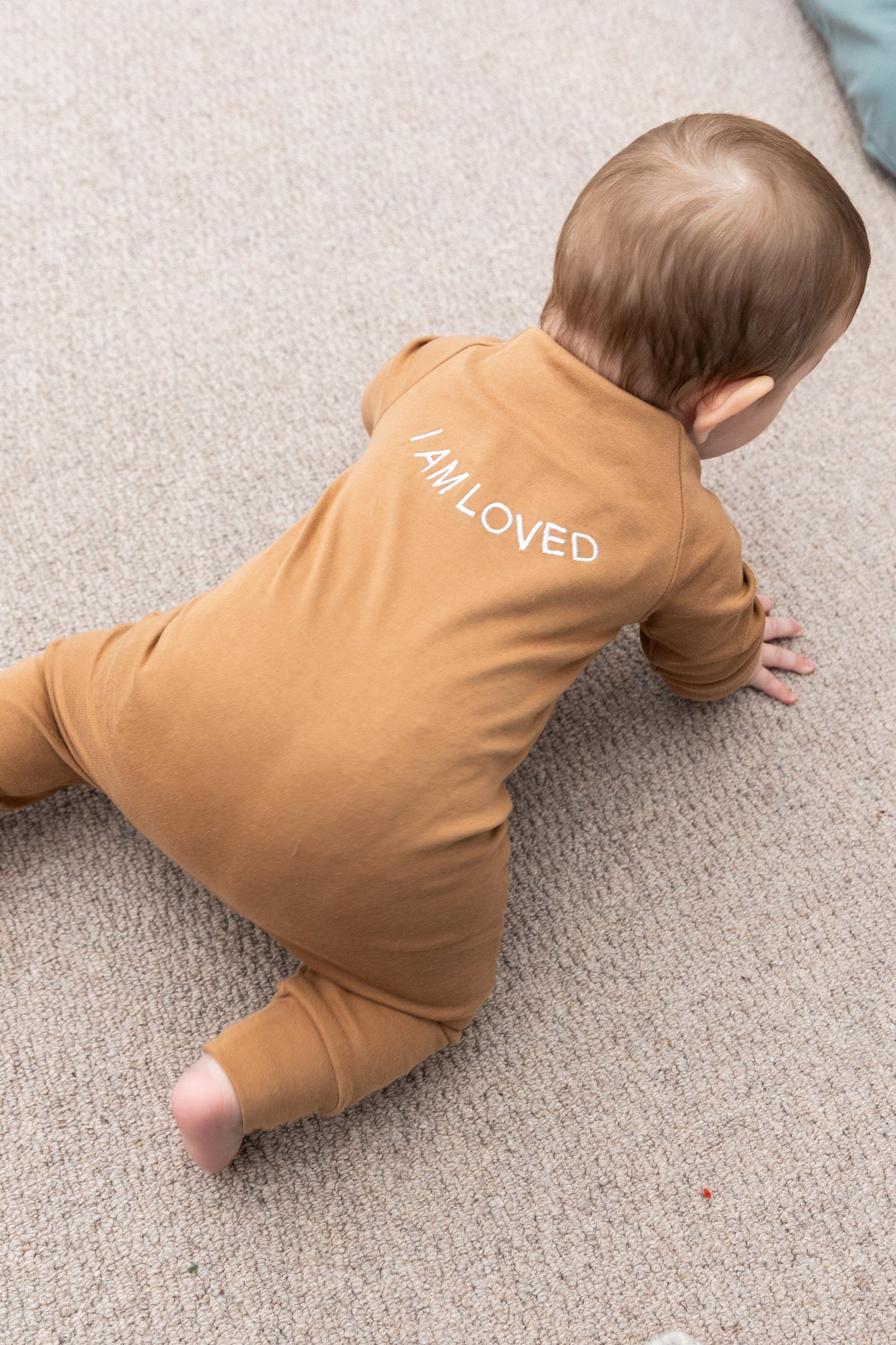 100% Organic Cotton Baby onesie with I AM LOVED Affirmation Embroidery