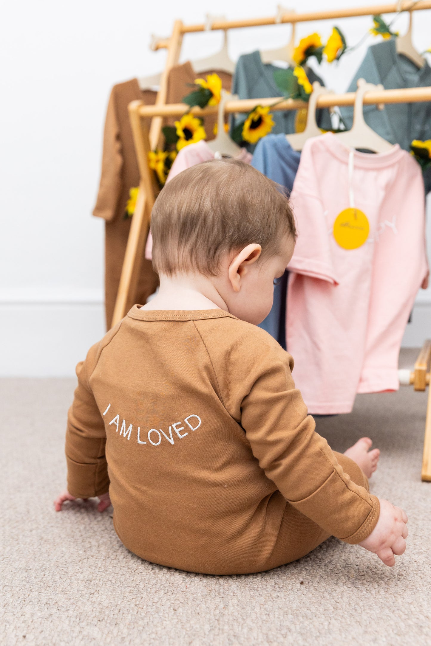 100% Organic Cotton Baby onesie with I AM LOVED Affirmation Embroidery